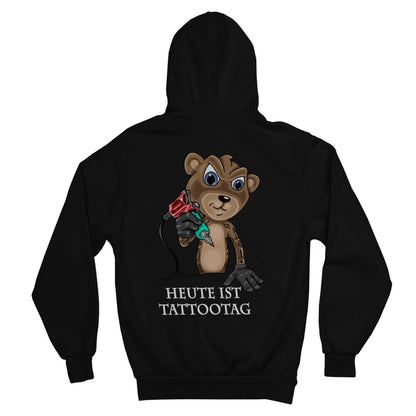 Tattootag - Heavy Oversized Hoodie Hoodie  XS Schwarz  Tattoo Fashion von inked-mafia.de. Dieses Teil gehört in jeden Kleiderschrank eines inked-rebels! Finde ideale Geschenke für Tätowierte, Tattoofans oder Tätowierer.